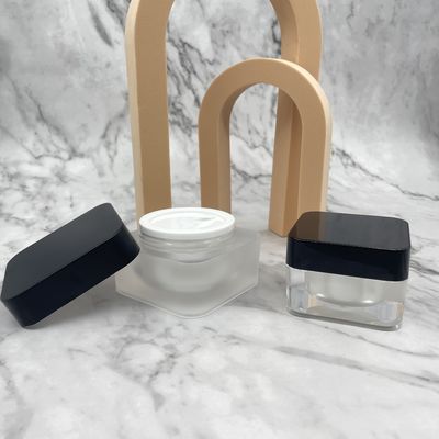 正方形のプラスチック化粧品は黒い帽子15g 30gが色をカスタマイズした小さい容器を震動させる