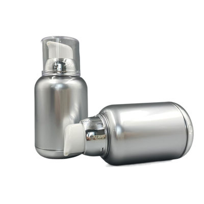 ねじれ80ml 100mlの空気のないポンプはMSが円形の底を金属で処理した真空PPをびん詰めにする