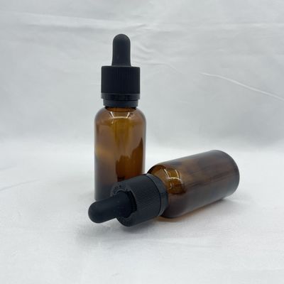 不透明なこはく色のガラス化粧品はPhototaxisの点滴器のタンパー明白な30mlをびん詰めにする